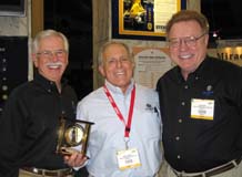 Uyemura USA President Tony Revier (left) and Director of Operations Don Walsh (right) congratulate West Coast Sales Manager Arnie Kremer on his 10 years of service to the company.